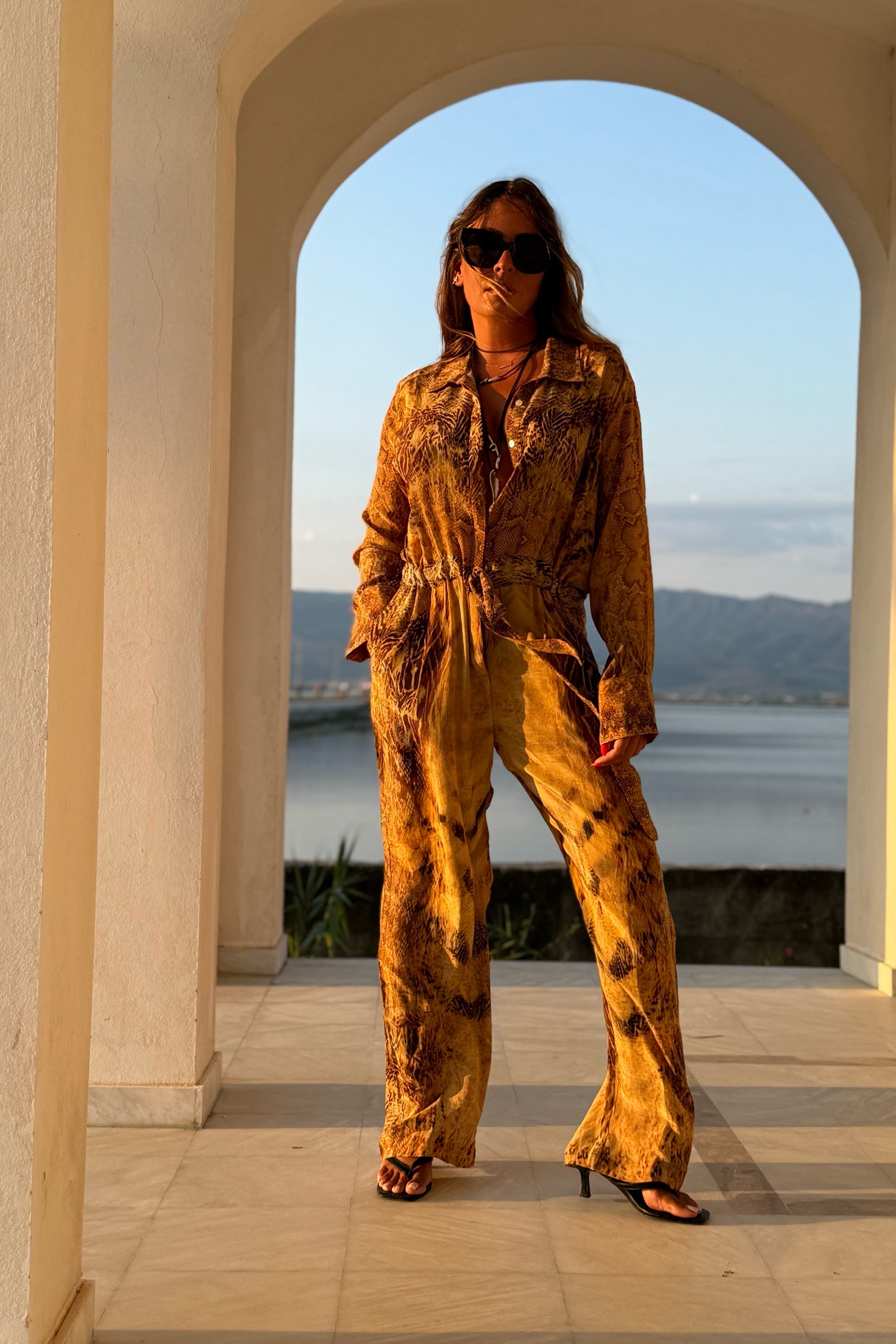 SILK JUMPSUIT WITH CRYSTALS
